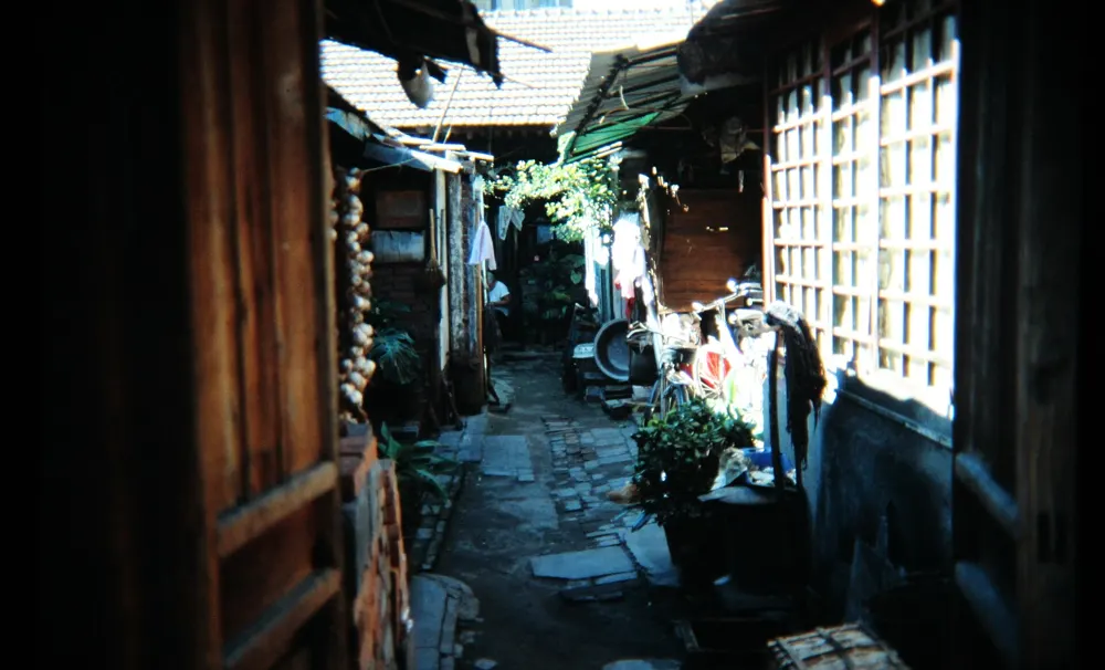 A narrow residential hutong alley in Beijing